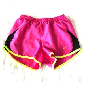 Pink Nike running shorts